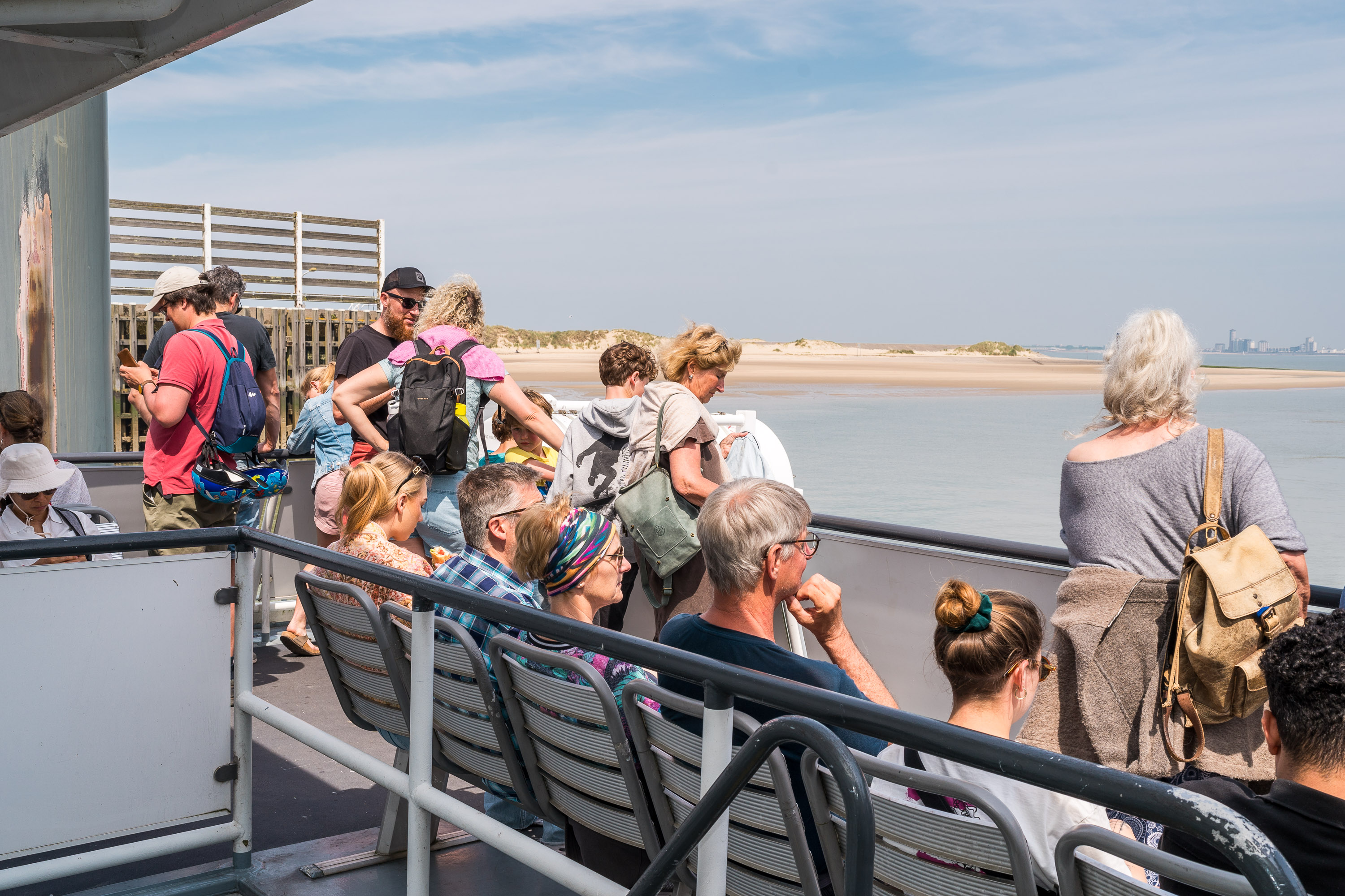 Passagiers op het achterdek