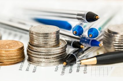 Piles of money on a tax form