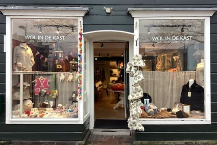 De gevel van winkel: Wol in de kast