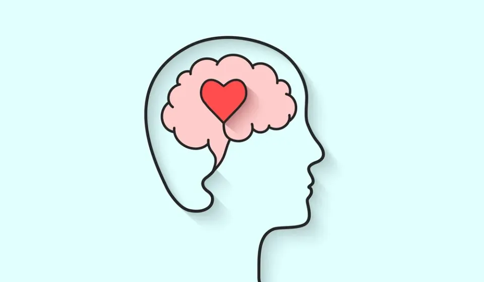 sillhouette of a person with a heart in their brain
