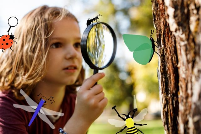kind kijkt door een loep naar insecten