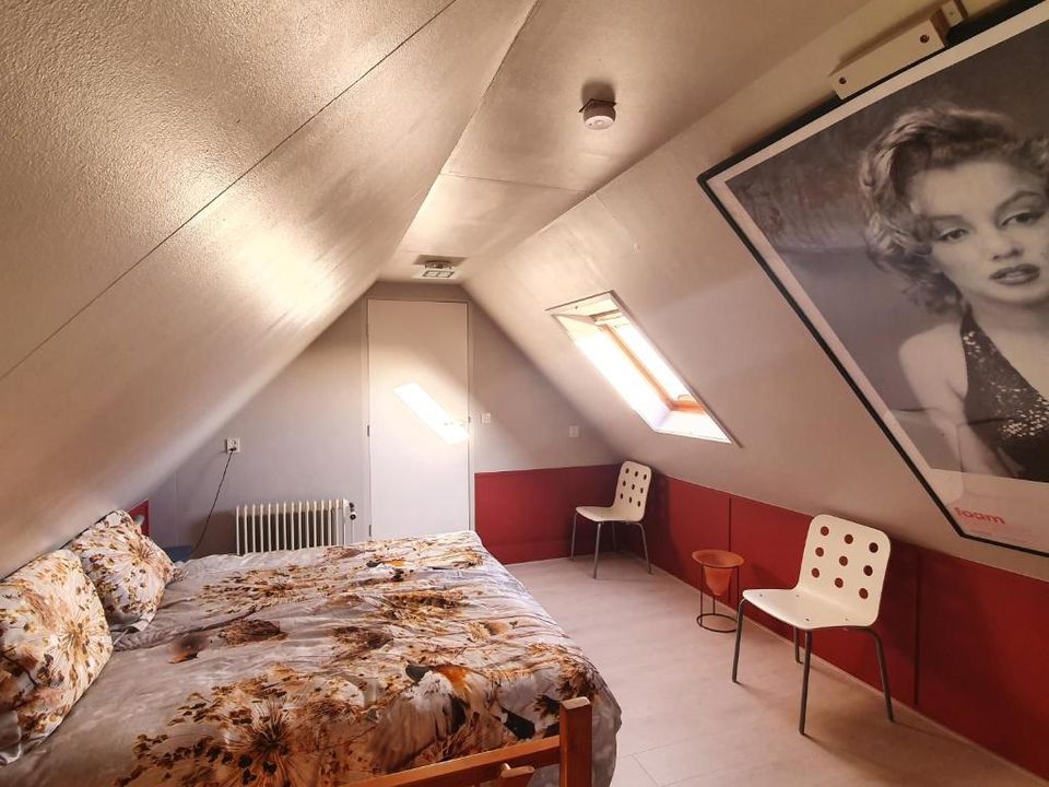 Slaapkamer van B&B Walvisch van Ghyspe