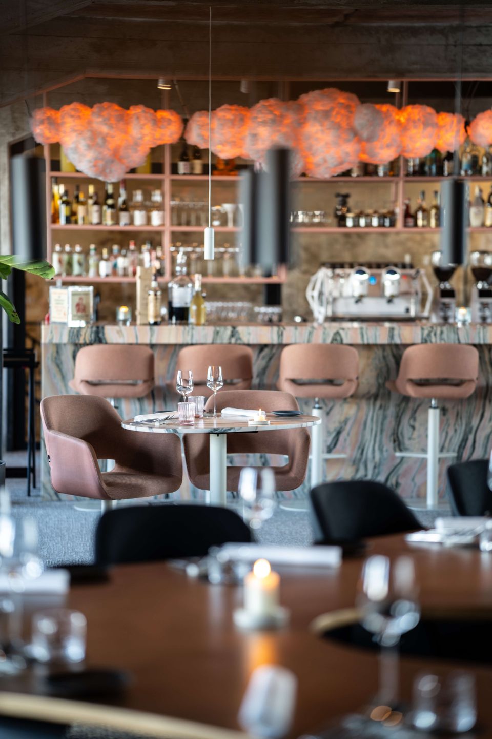 Novo New Dining Maastricht interior bar and a table
