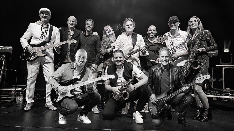 Een zwart-wit foto van een band