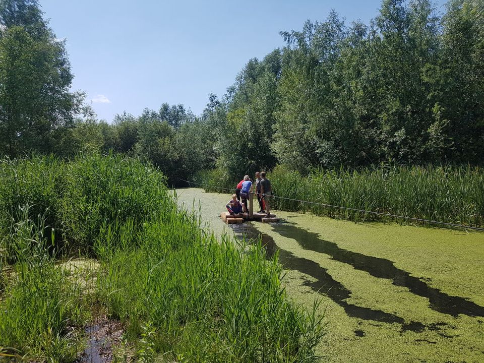 Groep mensen op sup.