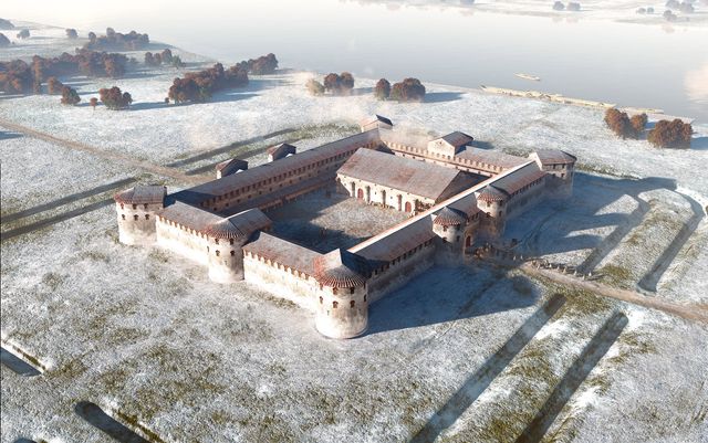 Een vierkant Romeins fort met ronde torens in de sneeuw., langs de Rijn in Duitsland.