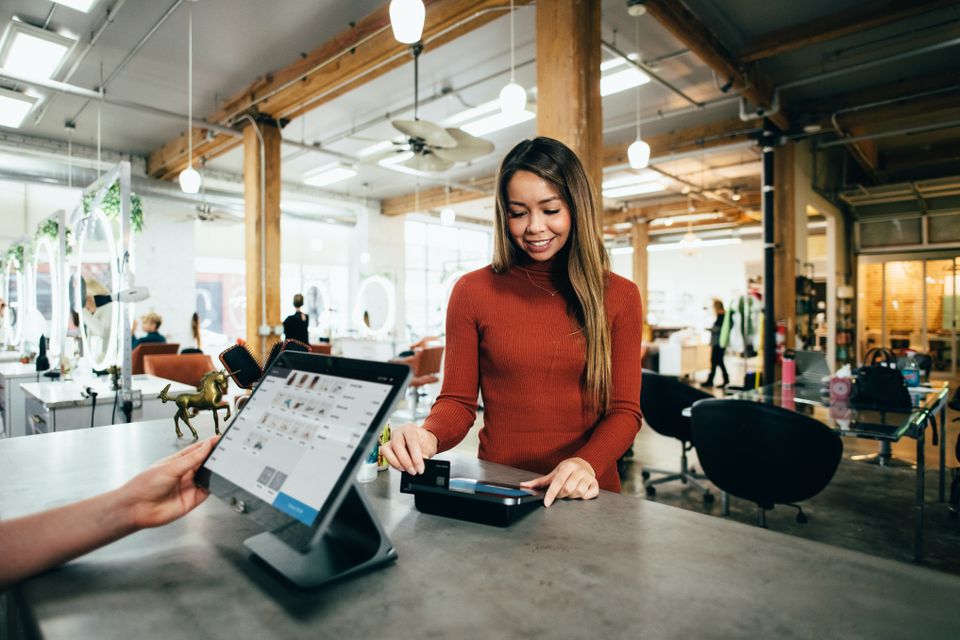 Person paying for their drinks