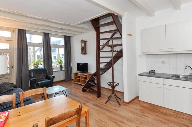 Woonkamer van Hotel Pension De Harmonie
