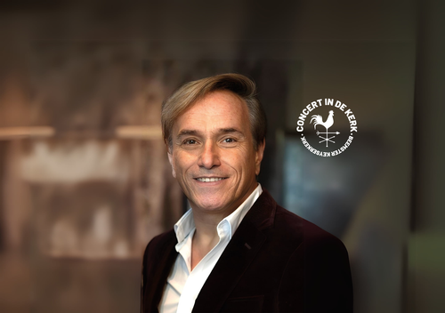 Foto van Philippe Elan in pak.