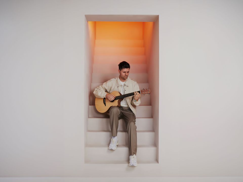 Simon keizer met een gitaar