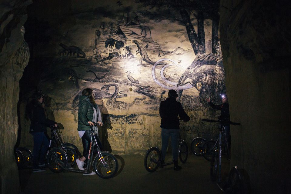 Mural caves Maastricht with scooter