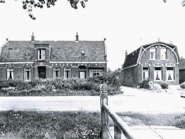 Een zwart-wit foto van huizen in De Beemster