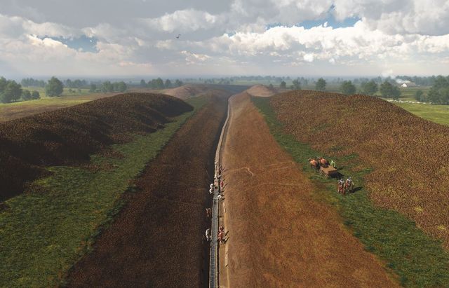 Door een landschap met verspreidde bomen loopt een diepe geul. In de geul werken mensen aan de aanleg van een houten goot.