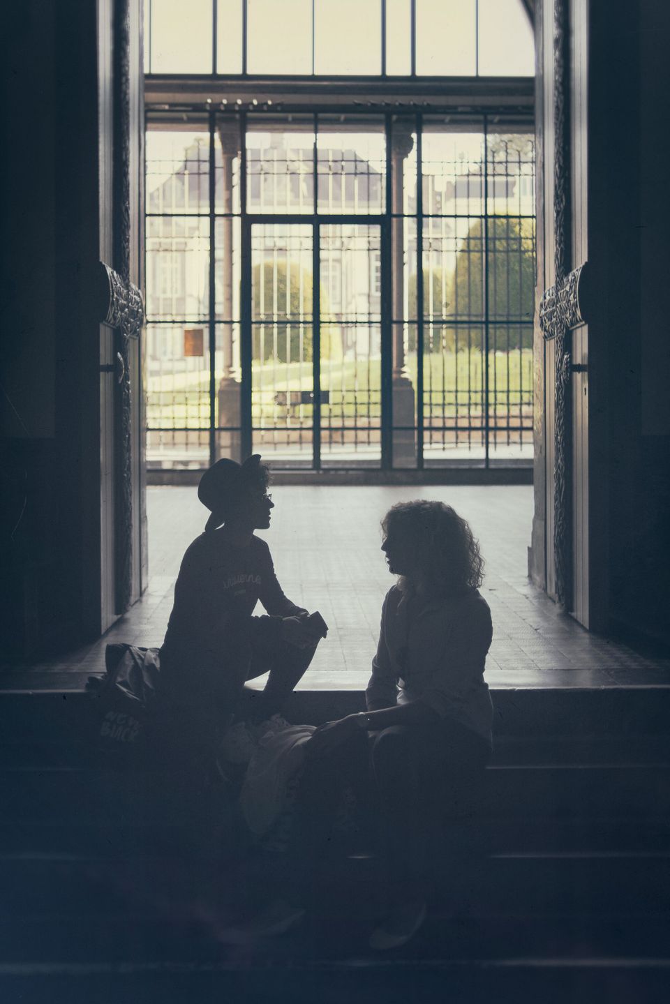 Two people in the Sint-Servaasbasiliek in Maastricht