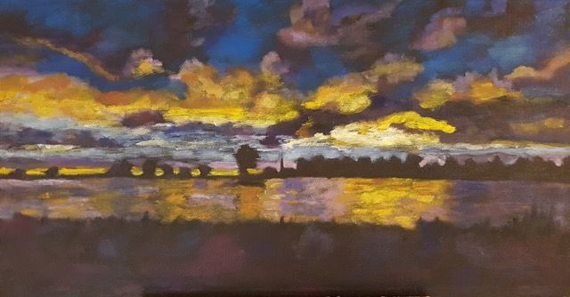 Avondlucht boven de Maas