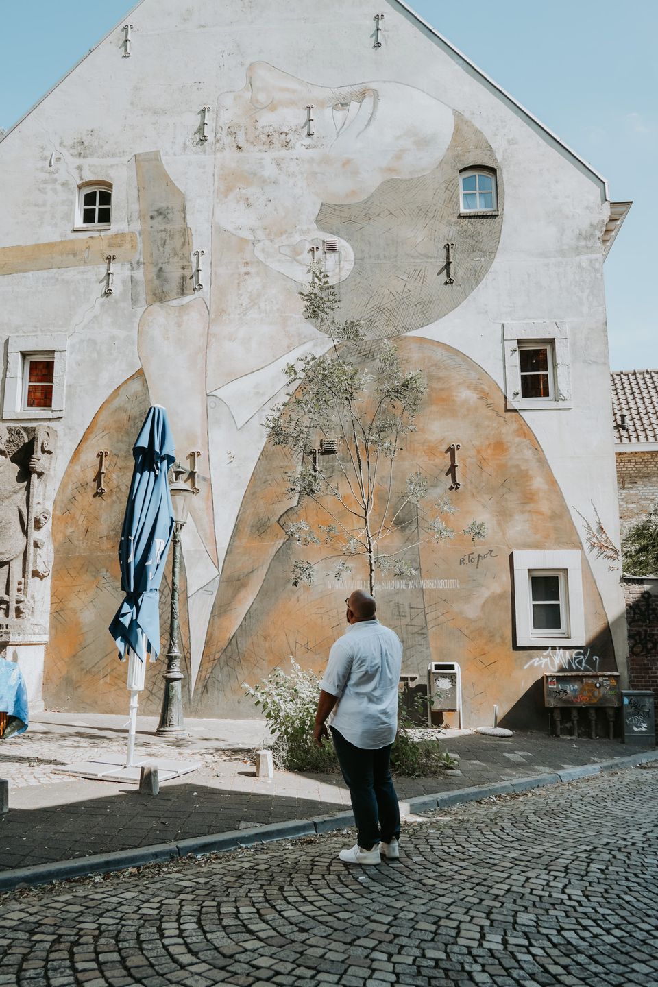 local Moon looking at human rights mural