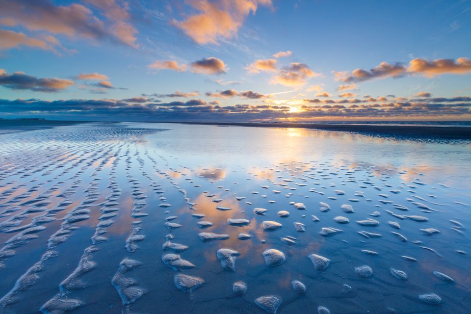 Zonsondergang op het strand
