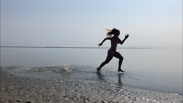 running on beach and in the sea