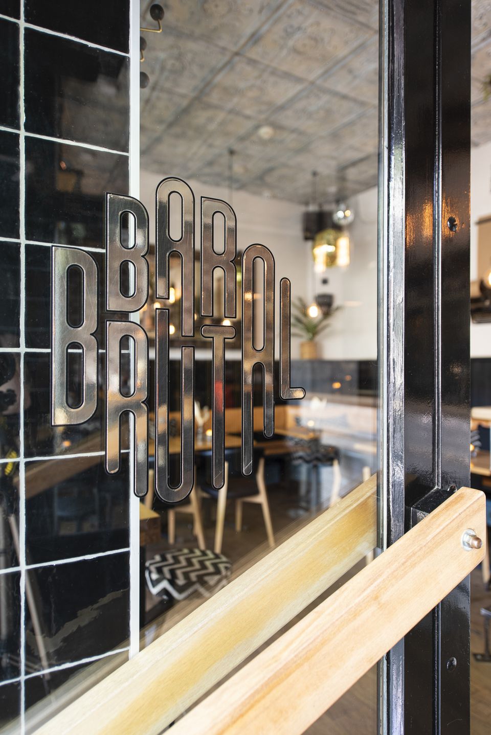 Bar Brutal window entrance with logo