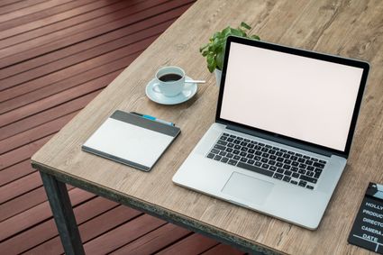 Desk with a laptop on it