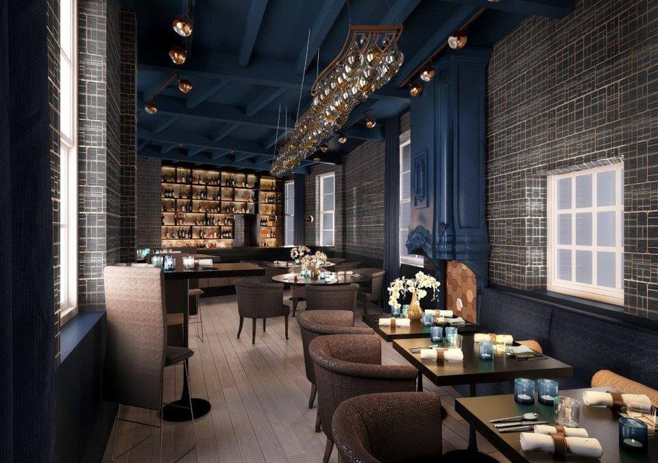 Luxe restaurantinterieur van Kasteel Montfoort met stijlvolle tafels, warme verlichting en moderne inrichting in een historisch kasteel.