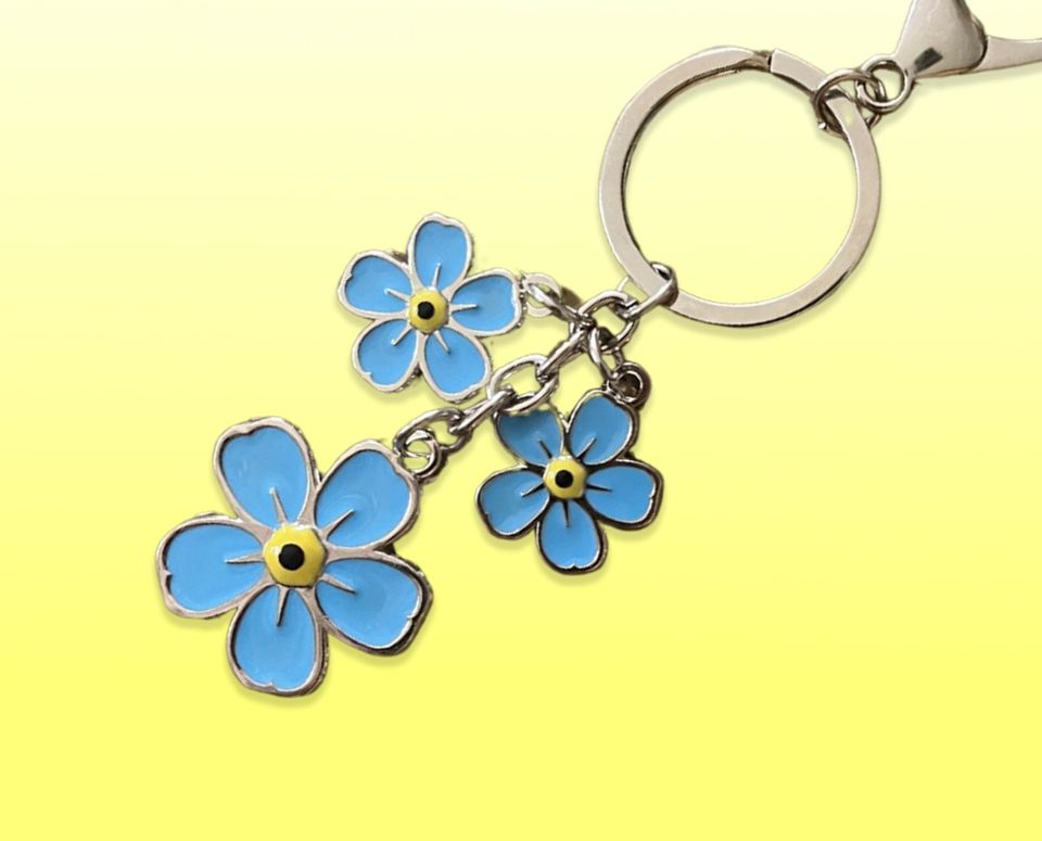 sleutelhanger met drie blauwe vergeet-me-nietjes