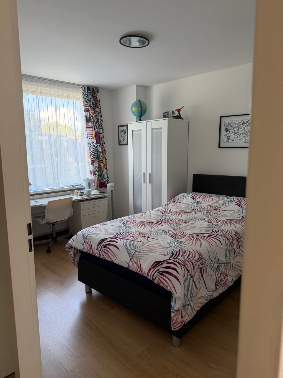 Een slaapkamer van B&B Hendrickje