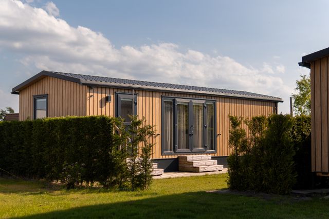 Außenansicht einer Chalet auf dem Camping De Wulp in Noordwijk