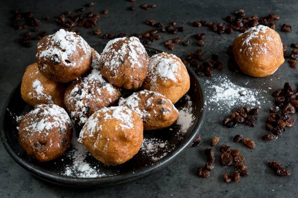 A table with oliebollen and raisins
