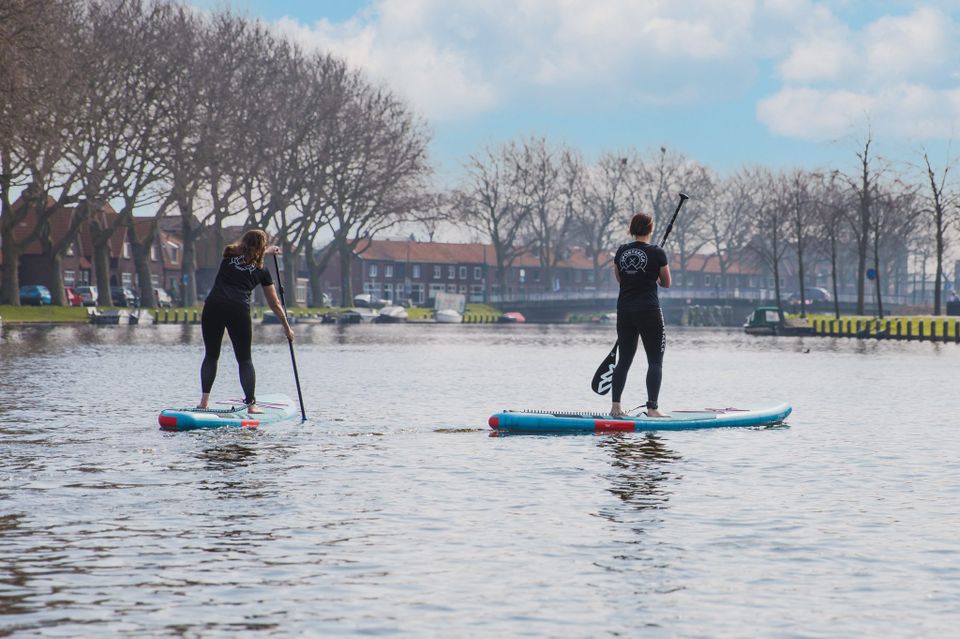 Suppen op het water met Sportsaeck in Woerden, actief buitenuitje met stand-up paddling in de stad.