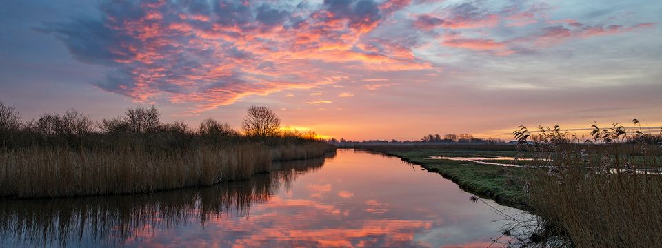 Een zonsopkomst in de Eilandspolder