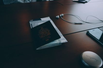 A passport on a table.