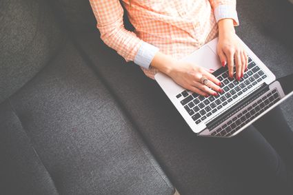 Woman using her laptop
