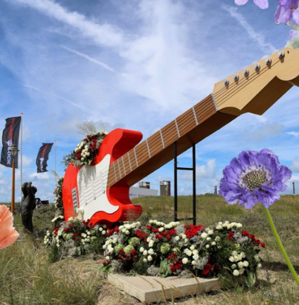 Mega gitaar met bloemen, wagen van de flowerparade