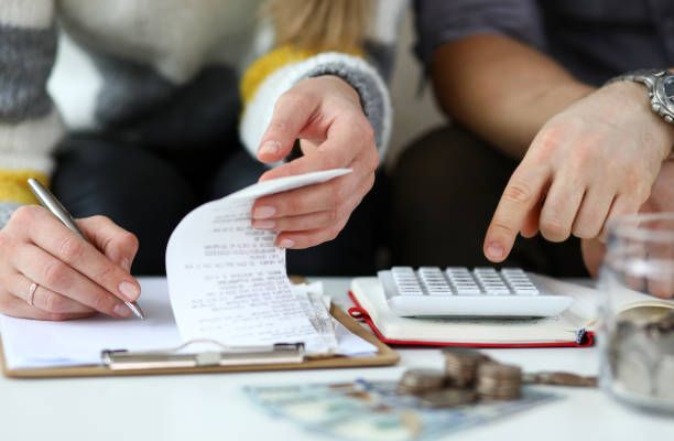 people doing their finances.