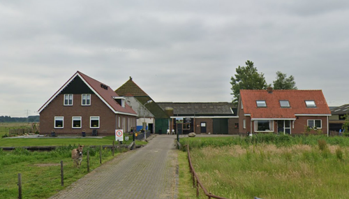 De buitenkant van Blaarkopboerderij van Staaveren
