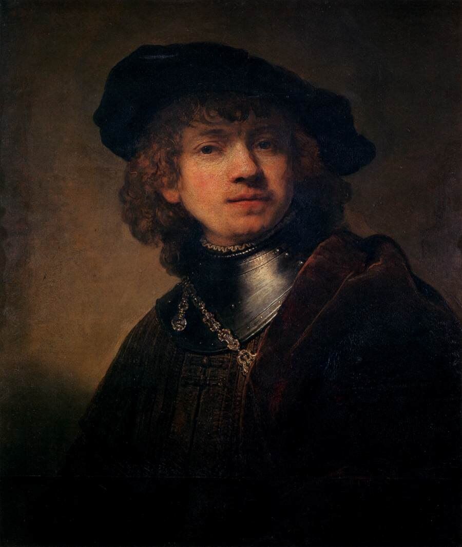 Tronie of a Young Man in a Gorget and Cap. Possibly an unfinished painting by Rembrandt, that was finished by another hand.