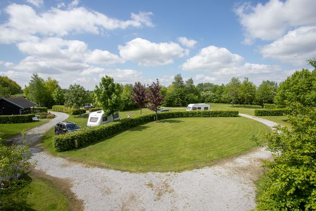 Camping De Oosterweide plek 26, 27 23,24 & 25