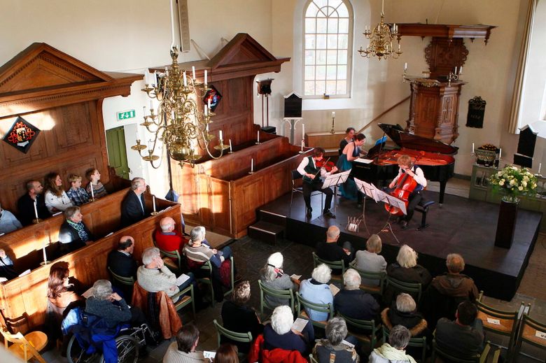 Dorpskerk interieur tijdens lustrumconcert Cultbee