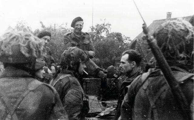 Armoured car with troops and Polish paratroopers on the Molenstraat. This is at the same location as where you are now.