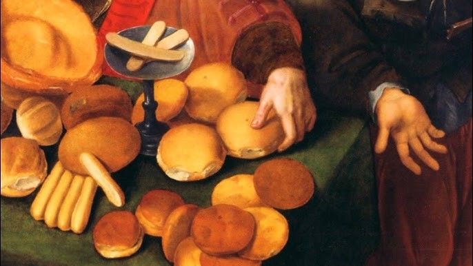 Detail uit schilderij met broden