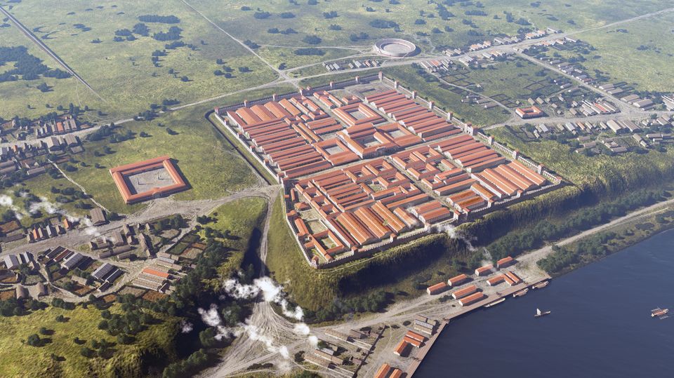 Impressie van de legioenplaats met omliggende nederzetting. Midden boven het amfitheater.