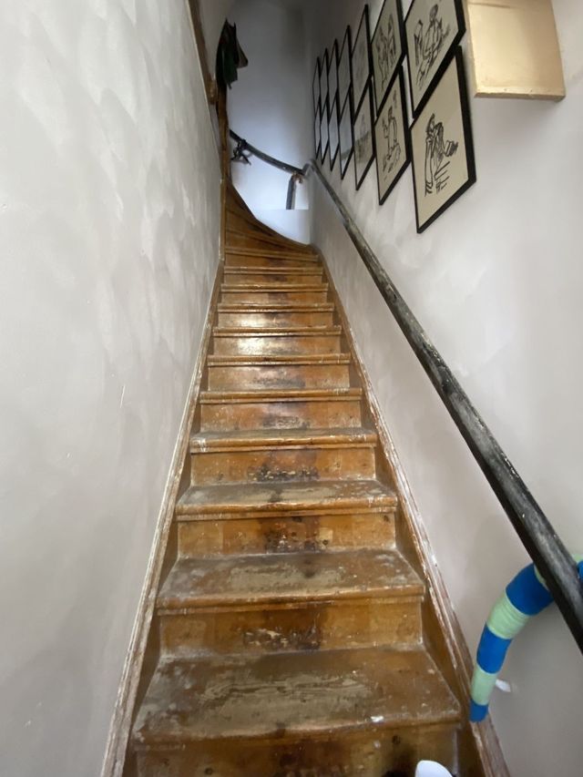 De draai van de trap van Hertogstraat 10 uit 1901.