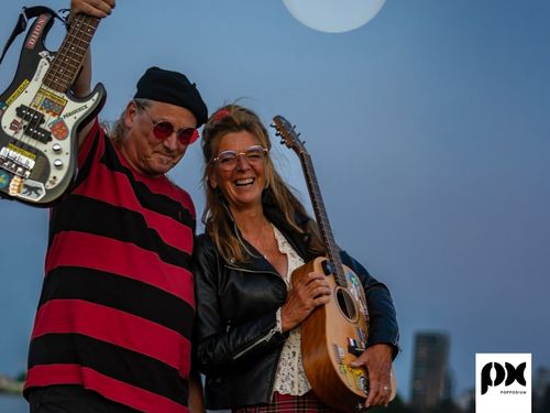 Man en vrouw met een gitaar