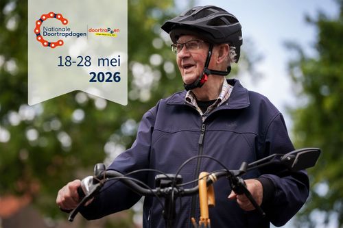 Foto van man met fiets