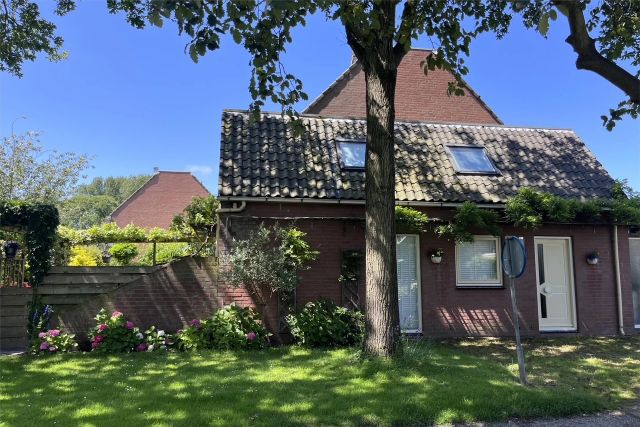 Het vooraanzicht van een huis.