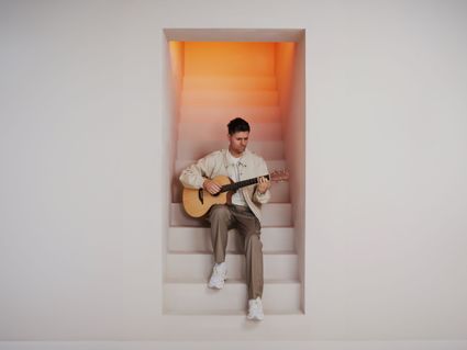Simon keizer met een gitaar