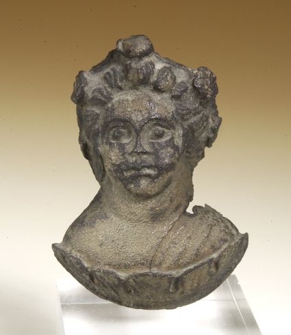 Bronzen kopje van de Romeinse god Bacchus op jeugdige leeftijd uit Wijk bij Duurstede.