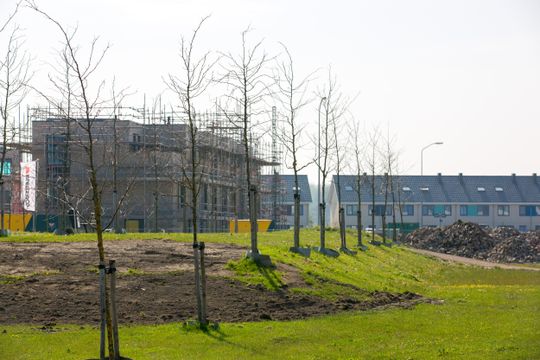 Woningen in de steigers tijdens de bouw op Warande in Lelystad, Flevoland
