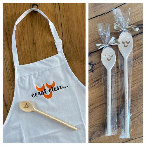 Schort met tekst Eerst eten en houten pollepel